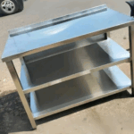 Stainless steel table with two shelves